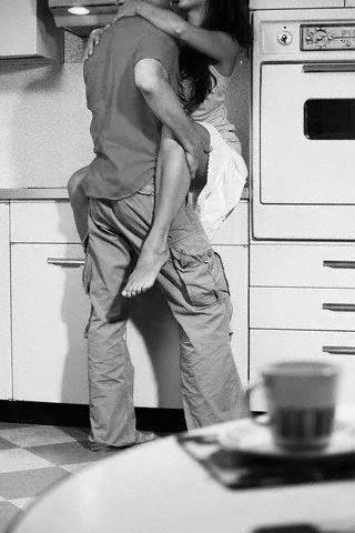 Image may contain: one or more people, people standing, kitchen and indoor