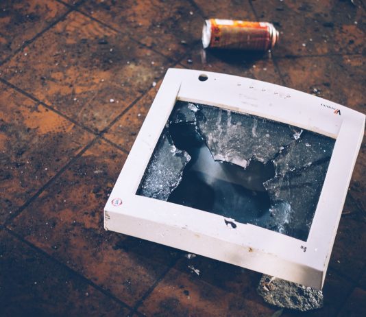 A broken monitor on the floor