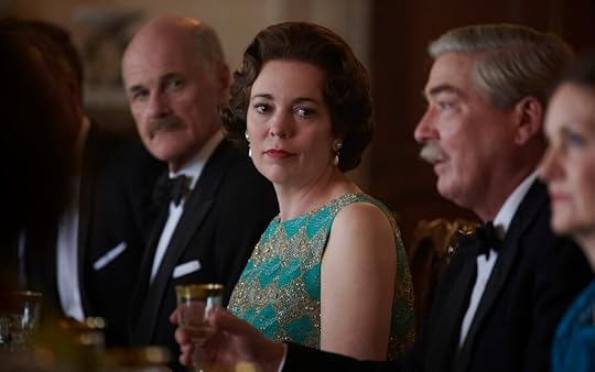 Olivia Colman as Queen Elizabeth II in a party scene in the first episode of Season 3 of the Crown on Netflix.