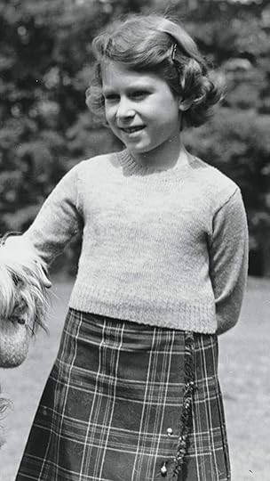 Elizabeth as a girl in 1936, wearing almost the same outfit she wears as an adult. Photo: Getty.