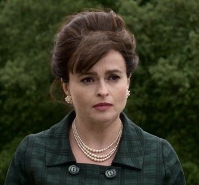 Helena Bonham Carter as Princess Margaret in The Crown, wearing a plaid outfit very much like what Elizabeth wears her entire life.