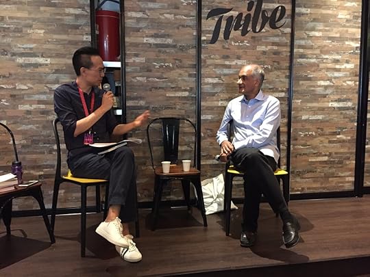 Pico Iyer (right) musing on Autumn in Japan