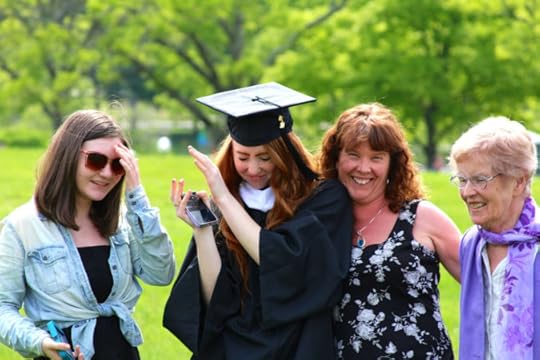 graduate with family