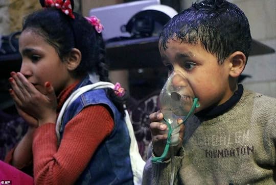 This image released early on April 8, 2018 by the Syrian Civil Defense White Helmets shows a child receiving oxygen through respirators following the alleged poison gas attack. However, a dissenting scientist, employed by the Organisation for the Prohibition of Chemical Weapons (OPCW) says in a leaked email that investigations on the ground at Douma have produced no hard evidence that the alleged gas attack took place