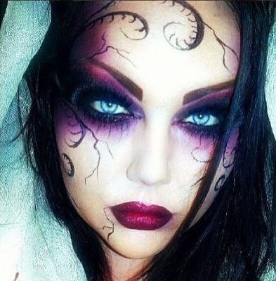 Shot of a photo with purple make-up with special designs