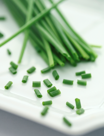 chives on a plate for the corn custard - one of the three go-to recipes