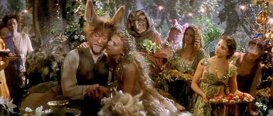 A scene from the 1999 film version of A Midsummer Night’s Dream, featuring Michelle Pfeiffer as Titania and Kevin Kline as Nick Bottom.