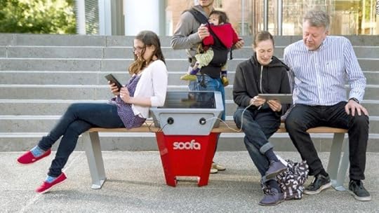 Bench with a big solar power charger built into the center of the bench.