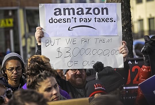 European Protesters Demand Amazon Stop Treating Workers Like Robots
