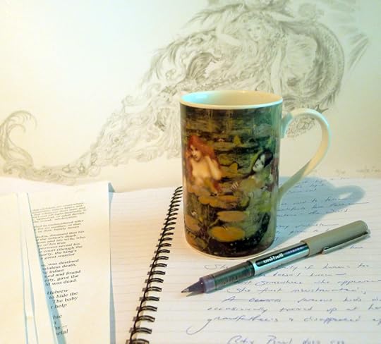 Desktop with Waterhouse coffee mug and Marja Lee drawing