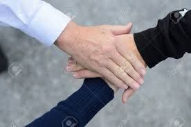 three men's hands clasped together - Google Search