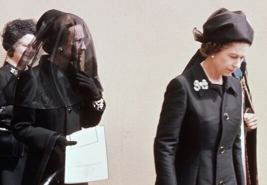 The real life Wallis Simpson, Duchess of Windsor, and Queen Elizabeth, at the Duke of Windsor’s funeral.