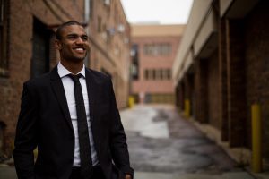 man walking in city discovers 3 essential factors for success