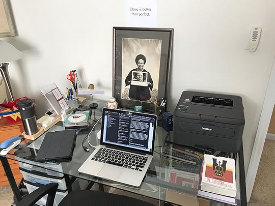 A photo of my desk with the words 
