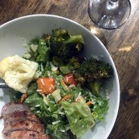 salad bowl with vegetables and pork