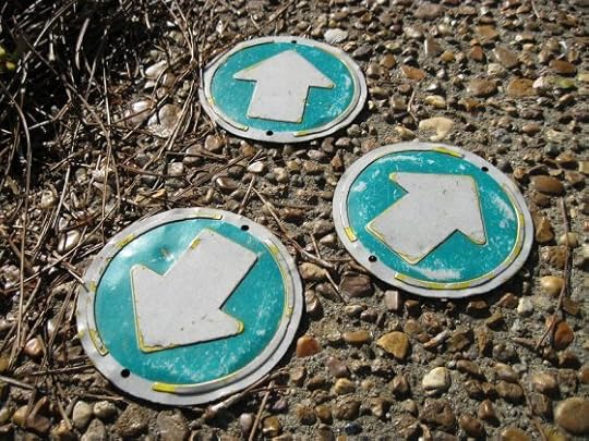 Markers pointing in different directions
