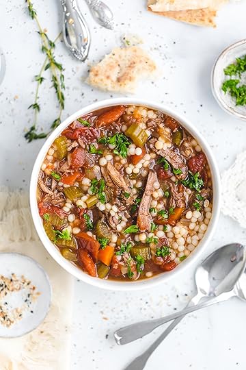 Slow Cooker Beef Soup with Couscous - This delicious slow cooker recipe has all the rich, savory flavor of a long-simmered beef stew, only it's lighter and more brothy, with fall-apart-tender chunks of beef and an aromatic beef broth made with garlic, onion, carrot, celery, bay leaves, fresh thyme, and a bit of soy sauce, which works to enhance that umami beef flavor.