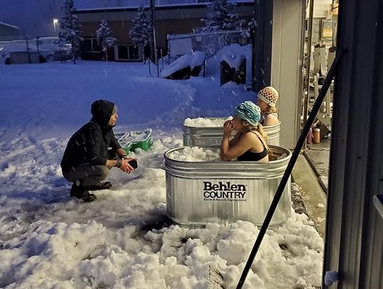 people doing wim hof breathing method in cold baths