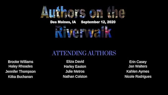This image has an empty alt attribute; its file name is authors-on-riverwalk-des-moines.jpg