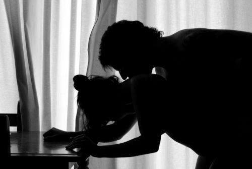 Image may contain: one or more people, people sitting and indoor