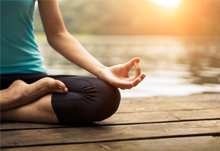 woman meditating in the morning