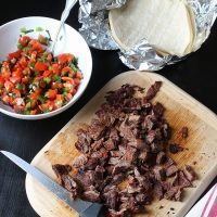 carne asada on cutting board