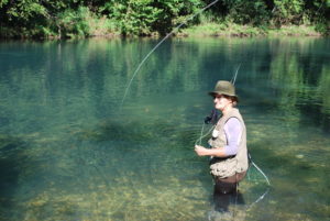 woman flyfishing