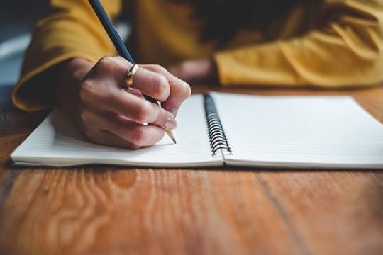 Woman writing letter by hand