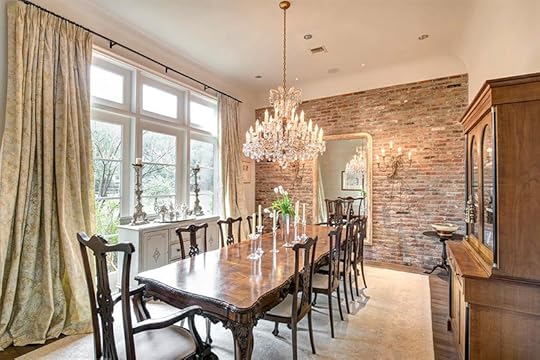 reclaimed brick accent wall in dining room