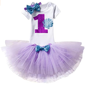 This is an image of toddler outfit dress in white and purple colors 