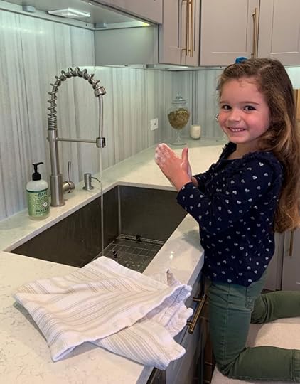 girl washing her hands