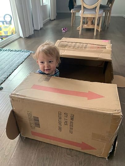 baby in cardboard box