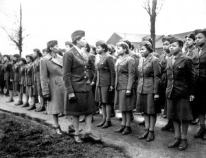 Maj. Charity E. Adams and Cpt. Abbie N. Campbell inspect women of the 6888th Central Postal Battalion