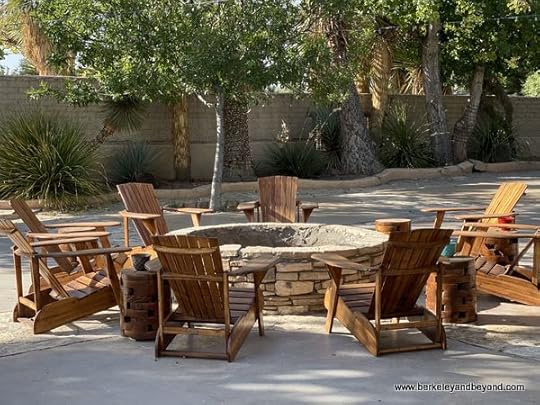 Adirondack chairs around fire pit at Gage Hotel in Marathon, Texas