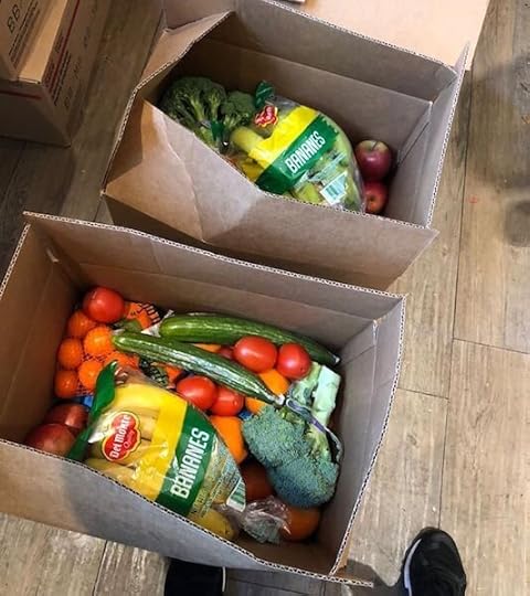 Crisis relief food boxes contain fresh fruit and vegetables, in addition to pantry items and other essentials.