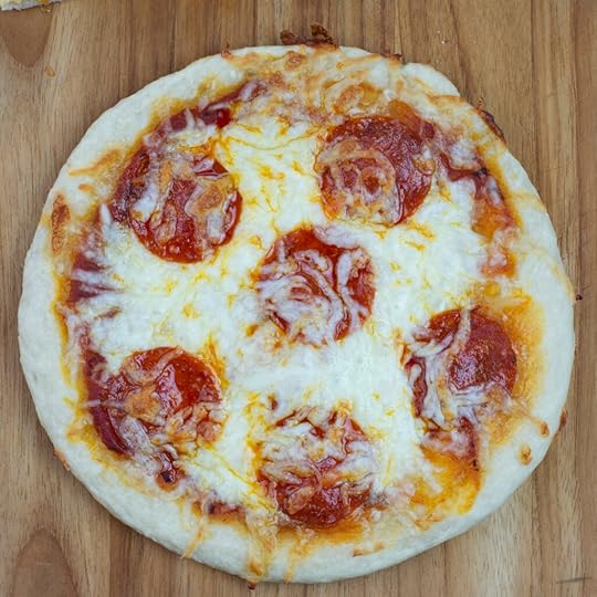 Deep dish personal pan pizza made with sourdough pizza dough made from sourdough starter discard