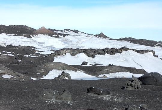 Two debris cones can be seen near the top of the ridge. See also the skua nest sites in the foreground.