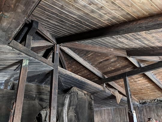 It’s hard to tell in this photo, but the ceiling actually slopes upwards to the centre, just like the roof except a shallower pitch.