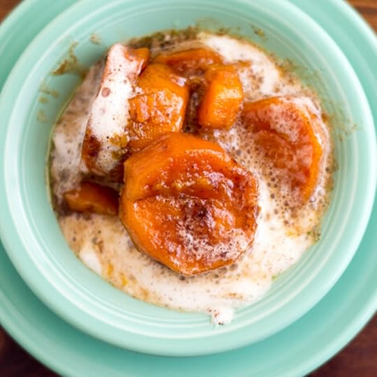Candied Sweet Potatoes in a teal Fiesta-ware bowl
