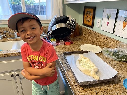 son learning to cook