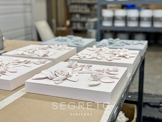 several clay mold floral art pieces