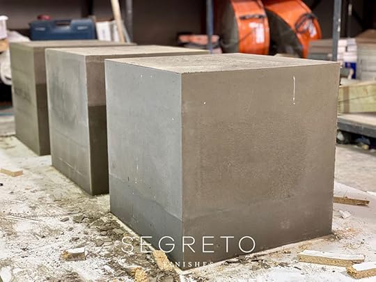 concrete cubes pured as bases for SegretoStone side tables
