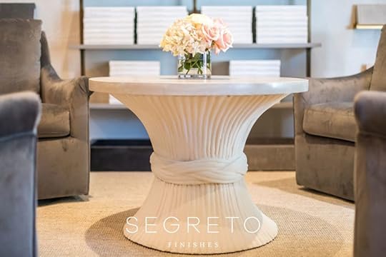 Segretostone coated side table with flowers