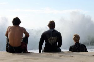 Men looking out to sea. Can you look beyond COVID-19 yet?