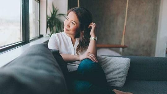 pensive woman on a couch