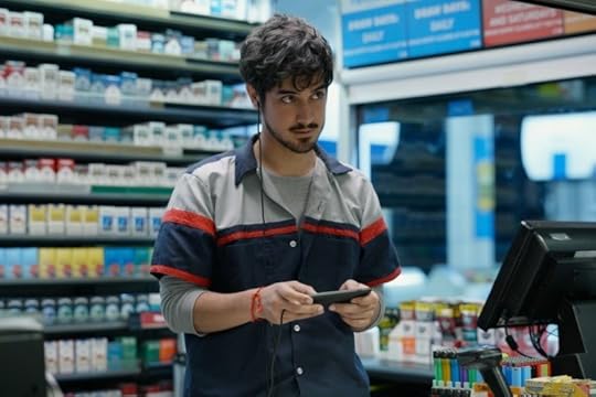 JJ stands in the gas station in Quibi's THE STRANGER.