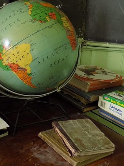 old time globe and school books