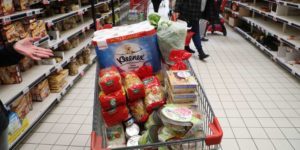 shopping cart overflowing with groceries