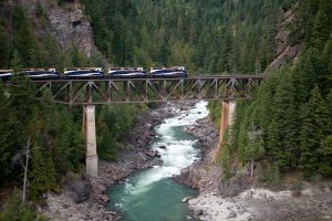 Rocky Mountaineer Train on bridge by Rocky Mountaineer