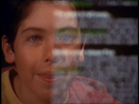 Close Up Reflection Of Boys Face In Computer Screen With Scrolling ...